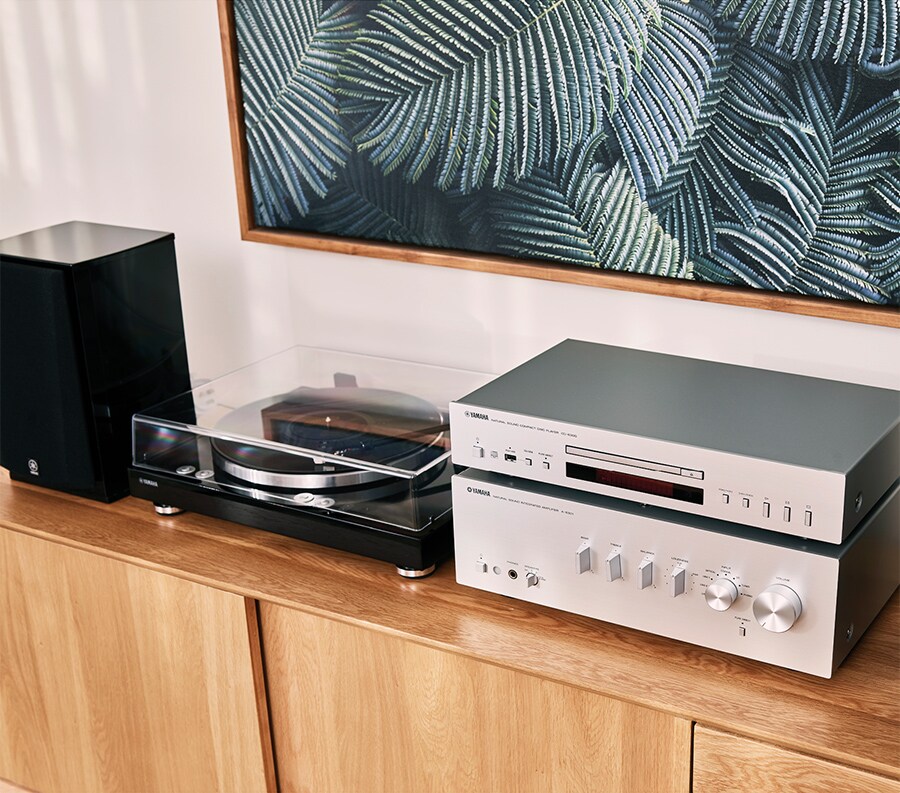 Yamaha MusicCast VINYL 500 – Smart Wireless Turntable Introduction The Yamaha MusicCast VINYL 500 (TT-N503) is a modern wireless belt-drive turntable designed to combine classic vinyl playback with advanced network streaming features. It allows users to enjoy traditional analog records while also integrating seamlessly into modern wireless Hi-Fi ecosystems through Wi-Fi, Bluetooth, and MusicCast multiroom technology. Manufactured by Yamaha, this turntable is built for users who want both authentic vinyl sound and smart connectivity in a single device. Core Function: Vinyl + Wireless Streaming The VINYL 500 is designed as a hybrid audio source: Traditional analog vinyl playback Wireless streaming via MusicCast Bluetooth audio transmission Network audio playback to compatible devices This allows users to play records not only on a stereo system but also across multiple rooms in a home audio setup. Belt-Drive Precision System The turntable uses a belt-drive motor system, which helps reduce vibration and mechanical noise for smoother playback. Key characteristics: Stable rotational speed (33⅓ and 45 RPM) Reduced motor interference Smooth and natural analog sound Die-cast aluminum platter for stability This ensures consistent and accurate vinyl reproduction. MusicCast Multiroom Integration One of the strongest features of the VINYL 500 is MusicCast multiroom capability. It enables: Streaming vinyl playback to multiple speakers Whole-home synchronized audio Room-by-room control via app Integration with Yamaha AV receivers and speakers This transforms vinyl listening into a fully connected home audio experience. Wireless Connectivity Options The system supports multiple modern connection methods: Wi-Fi (MusicCast streaming) Bluetooth (AAC / SBC) Traditional RCA analog output (phono/line selectable) This flexibility allows connection to: Hi-Fi amplifiers AV receivers Powered speakers Wireless speaker systems Built-In Phono Preamp The VINYL 500 includes a built-in phono stage, meaning it can connect directly to systems without an external phono amplifier. This provides: Easy plug-and-play setup Switchable phono/line output Clean signal amplification Compatibility with modern powered systems Audio Performance The turntable delivers high-quality analog playback with: Moving magnet cartridge system Low distortion output Wide frequency response Stable tracking tonearm design Clean signal-to-noise performance It is tuned for balanced and musical vinyl reproduction rather than aggressive coloration. Smart App Control Through the MusicCast app, users can: Control playback zones Stream vinyl to multiple rooms Adjust volume and output destinations Integrate with other MusicCast devices This provides a centralized smart control system for the entire home audio network. Design & Build Quality The VINYL 500 features a clean and modern design: Minimalist chassis layout Hinged dust cover Stable belt-drive platform Straight tonearm design Premium aluminum platter It is designed to blend into both modern and traditional Hi-Fi environments. Technical Specifications Product Type: Wireless Belt-Drive Turntable Model: Yamaha MusicCast VINYL 500 (TT-N503) Drive System: Belt-drive Speeds: 33⅓ RPM, 45 RPM Connectivity: Wi-Fi, Bluetooth, RCA (Phono/Line) Streaming System: MusicCast multiroom audio Cartridge Type: Moving Magnet (MM) Platter: Aluminum die-cast Tonearm: Straight static-balance tonearm Output Options: Phono / Line selectable Control: MusicCast mobile app Use Cases The VINYL 500 is ideal for: Home Hi-Fi vinyl listening Wireless multiroom audio systems Smart home audio setups Living room entertainment systems Hybrid analog/digital audio environments Yamaha MusicCast ecosystem setups Why It Stands Out The Yamaha VINYL 500 stands out because it combines: Traditional analog vinyl playback Wi-Fi MusicCast streaming Bluetooth wireless audio Built-in phono preamp Multiroom synchronization It is one of the few turntables designed specifically for users who want both vinyl authenticity and modern wireless convenience in one system. Conclusion The Yamaha MusicCast VINYL 500 (TT-N503) is a modern wireless turntable that bridges analog vinyl listening with smart home audio technology. With its belt-drive system, MusicCast multiroom integration, and dual wireless + analog connectivity, it delivers a flexible and future-ready listening experience for both casual users and Hi-Fi enthusiasts.